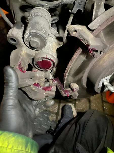 Caliper assembly stripped for full clean and rebuild
